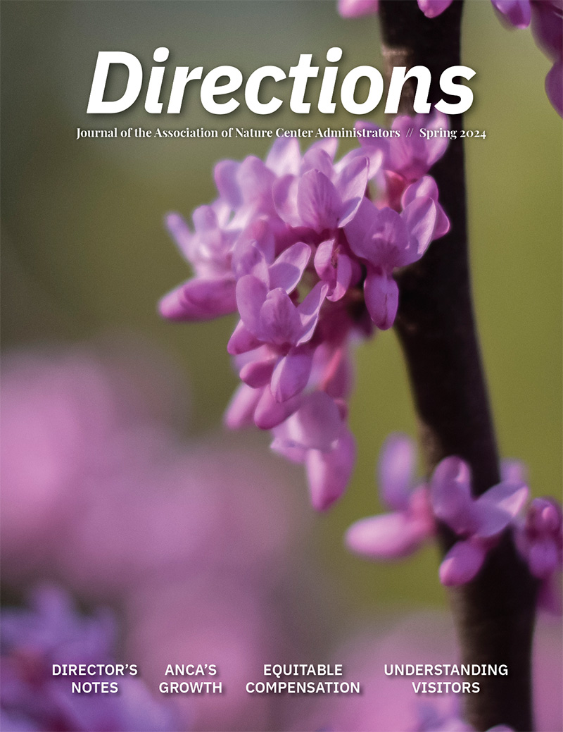 The cover of Directions. A pink redbud flower emerges from a branch. Above, the text "Directions."